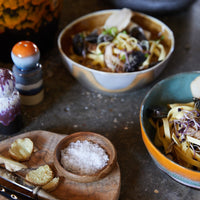 retro pasta plate with food on kitchen countertop