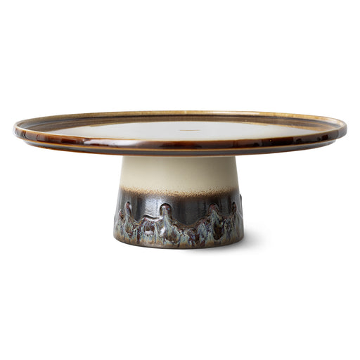 ceramic cake stand with reactive glaze finish and texture in brown tints