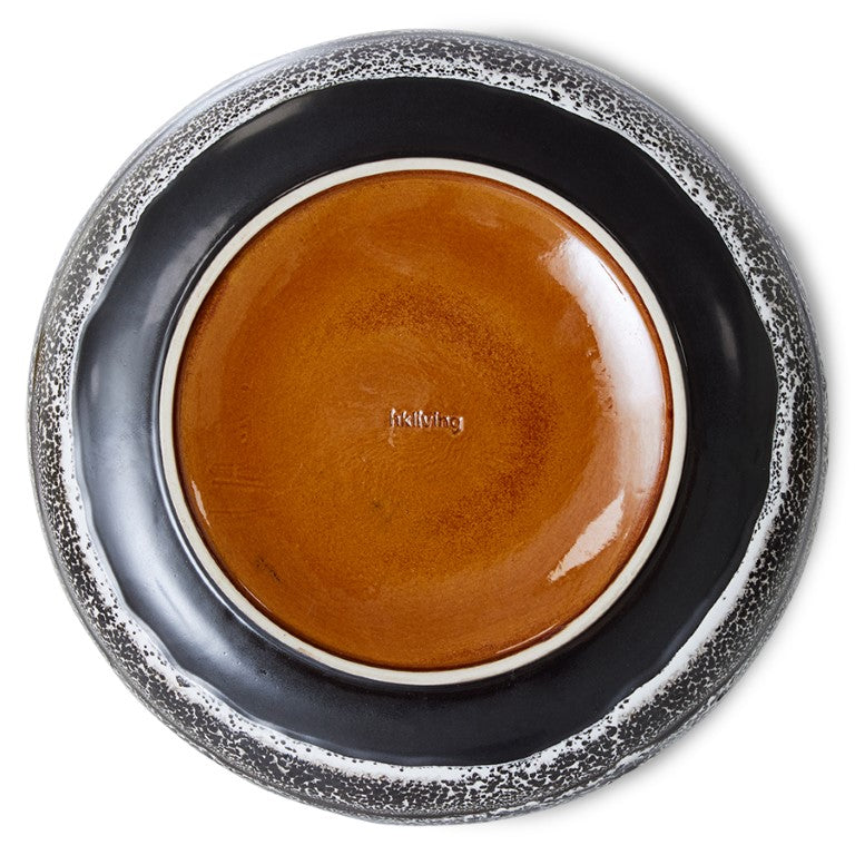 orange and brown back side of large serving bowl with hkliving logo
