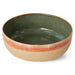 sand colored yellow and orange large bowl with green inside