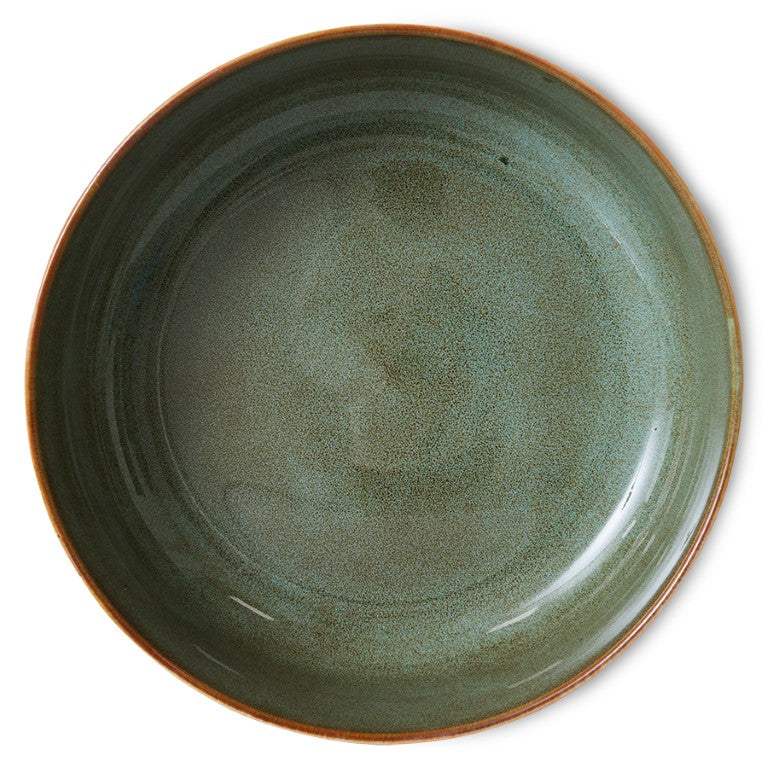 sand colored yellow and orange large bowl with green inside