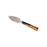 cheese knife with brown hues handle