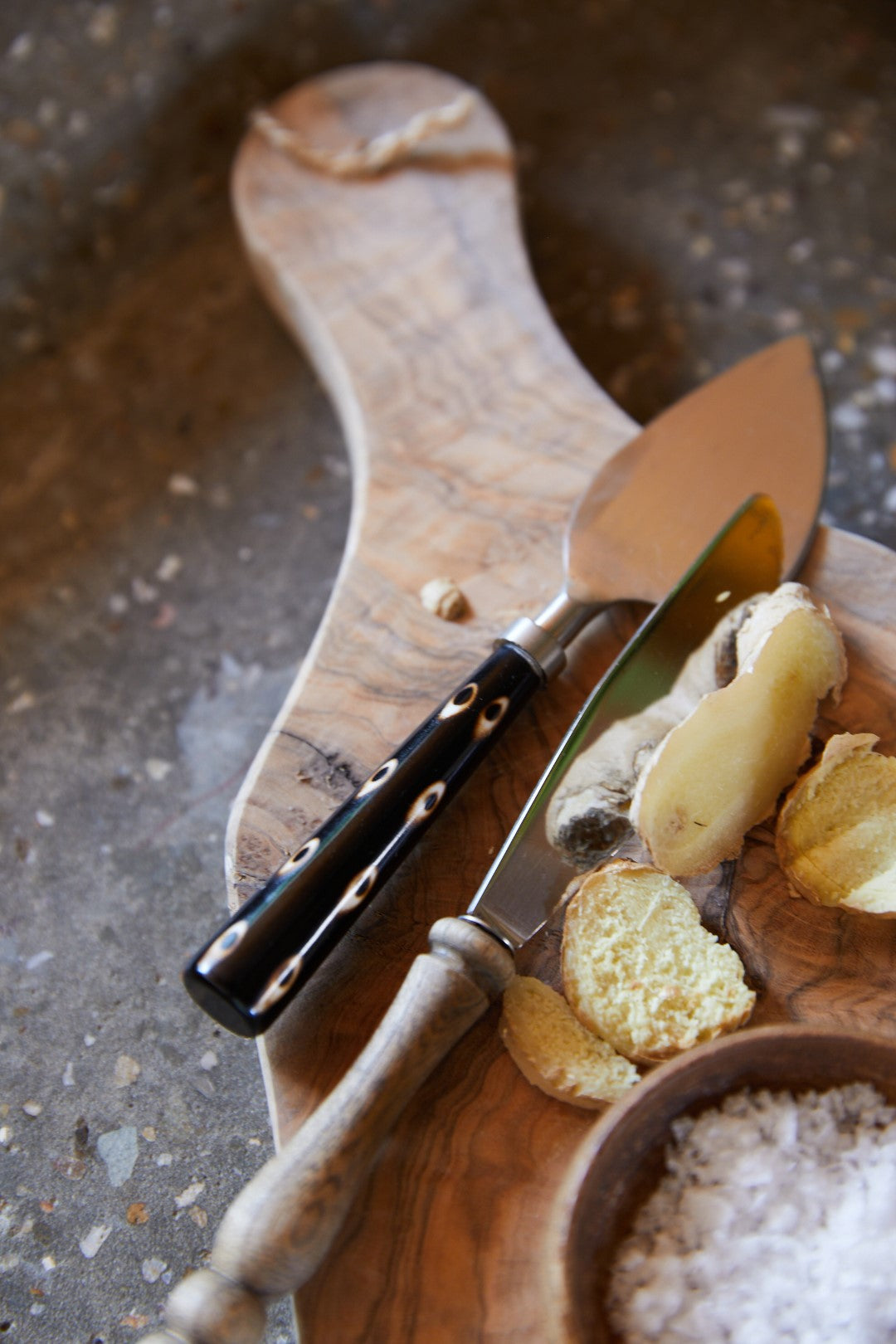 cheese knives on cheese platter