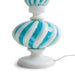 detail of blue and white glass table lamp base with white cord