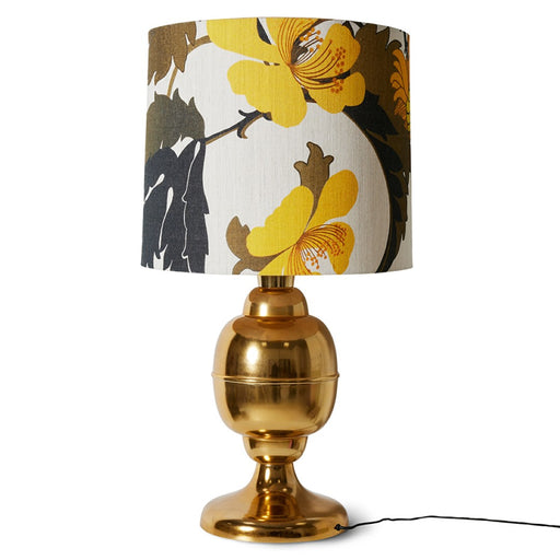 retro style lamp with brass base and floral shade