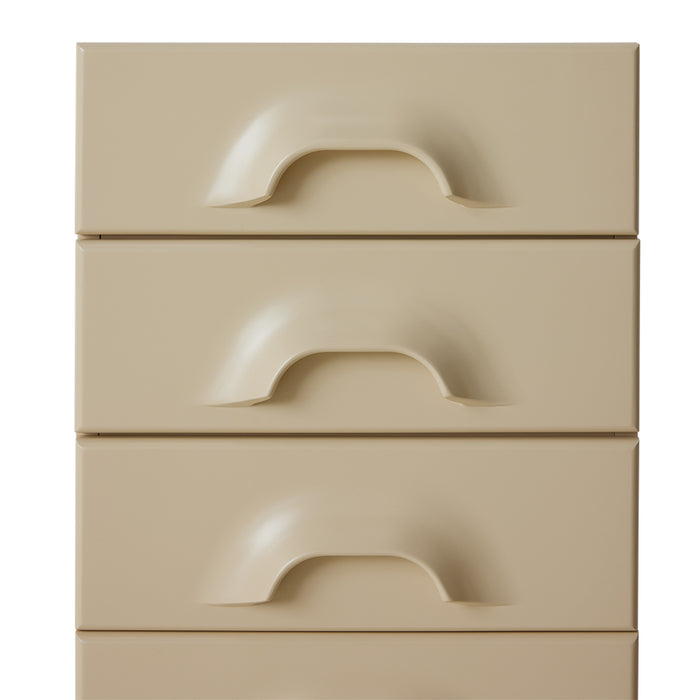 detail of drawers in cream colored cabinet