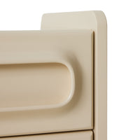 detail of retro look nightstand in cream color with two drawers