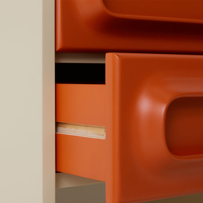 detail of orange and cream retro look nightstand with two drawers