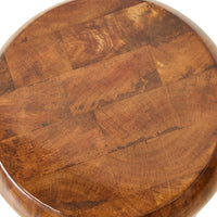 detail of wooden stool with high gloss shellack finish in light brown