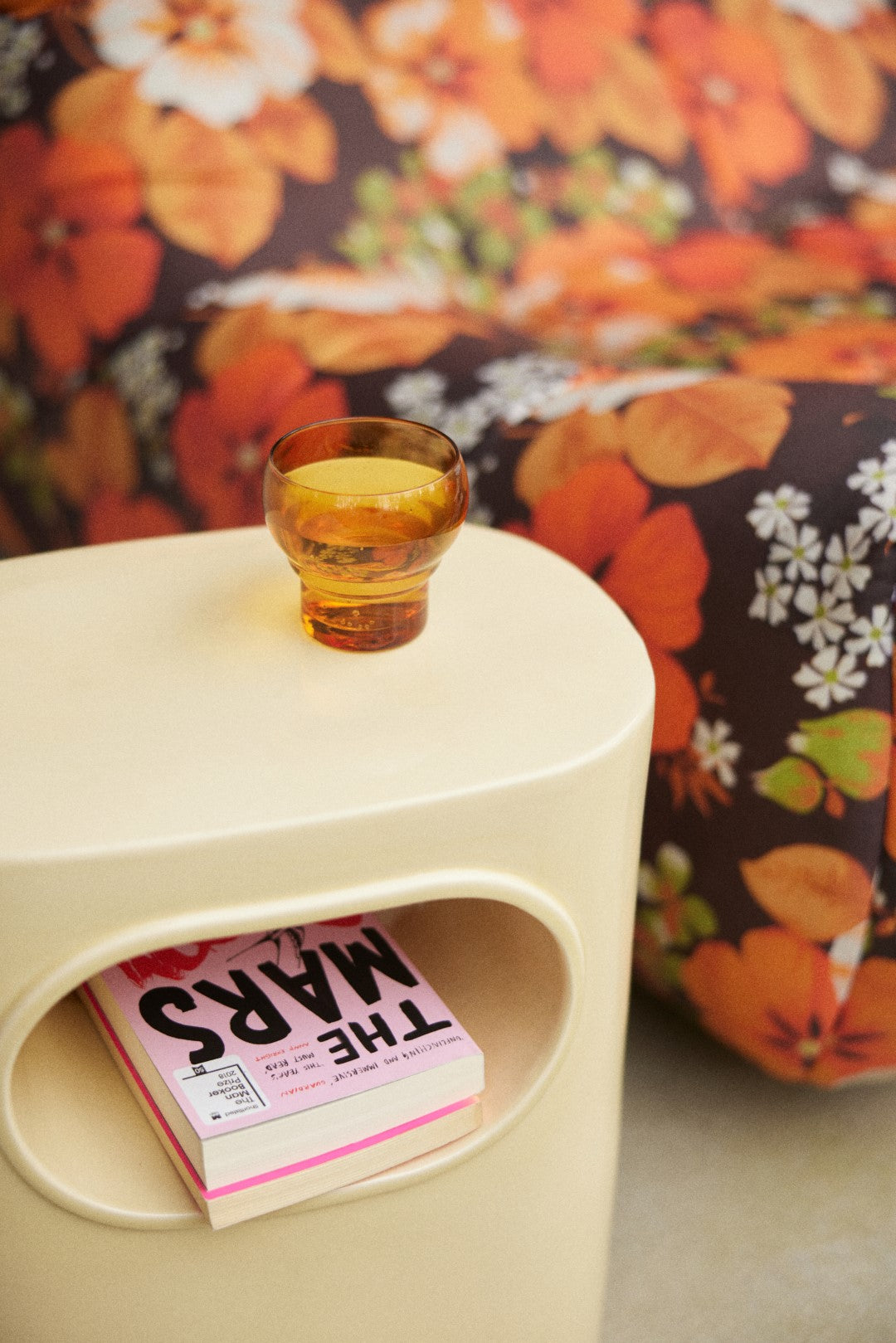 earthenware accent table with open space for books