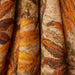 detail of bathrobe with pockets and orange brown palm tree motive