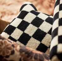 black and white checkered woolen decorative pillow