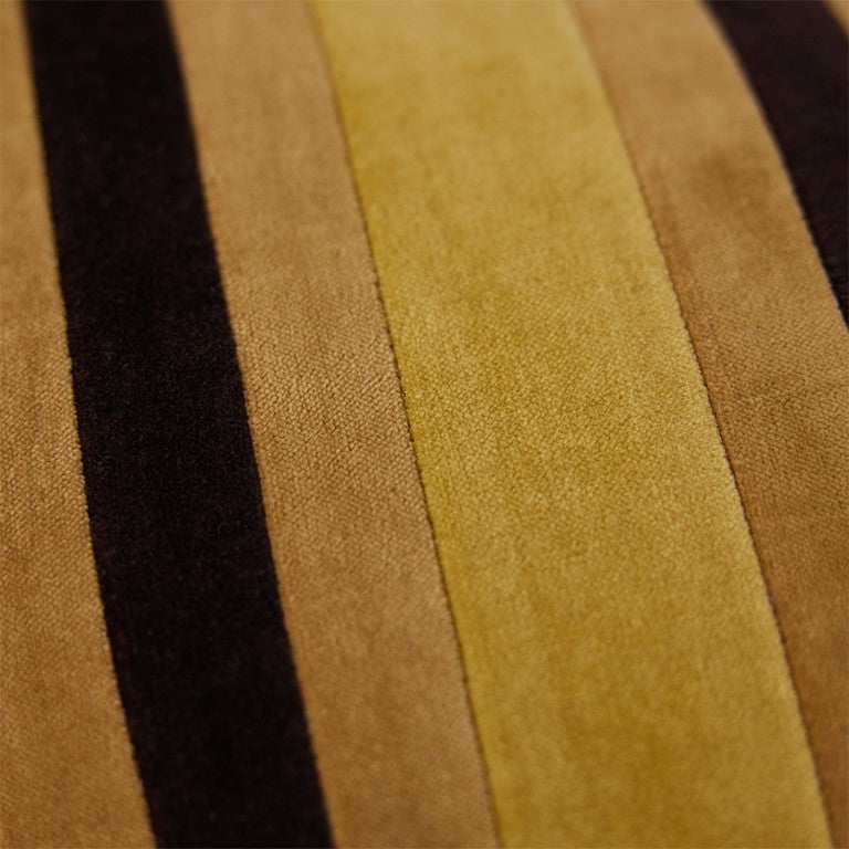 detail of caramel toned velvet lumbar pillow