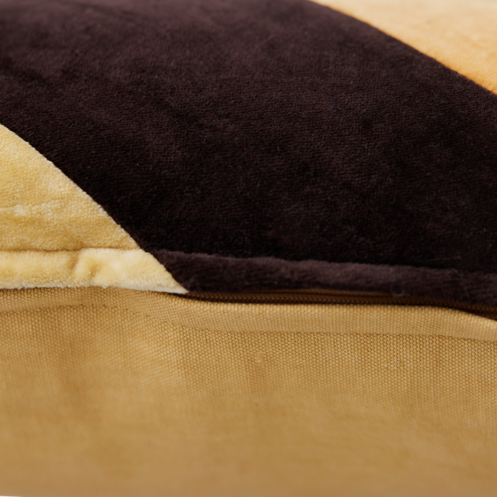 detail of yellow orange and black velvet lumbar pillow