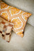 close up retro style pillow with yellow flower print