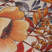 detail of retro style lumbar pillow with floral print
