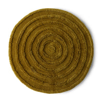 round rug with high and low poles in a greenish yellow color