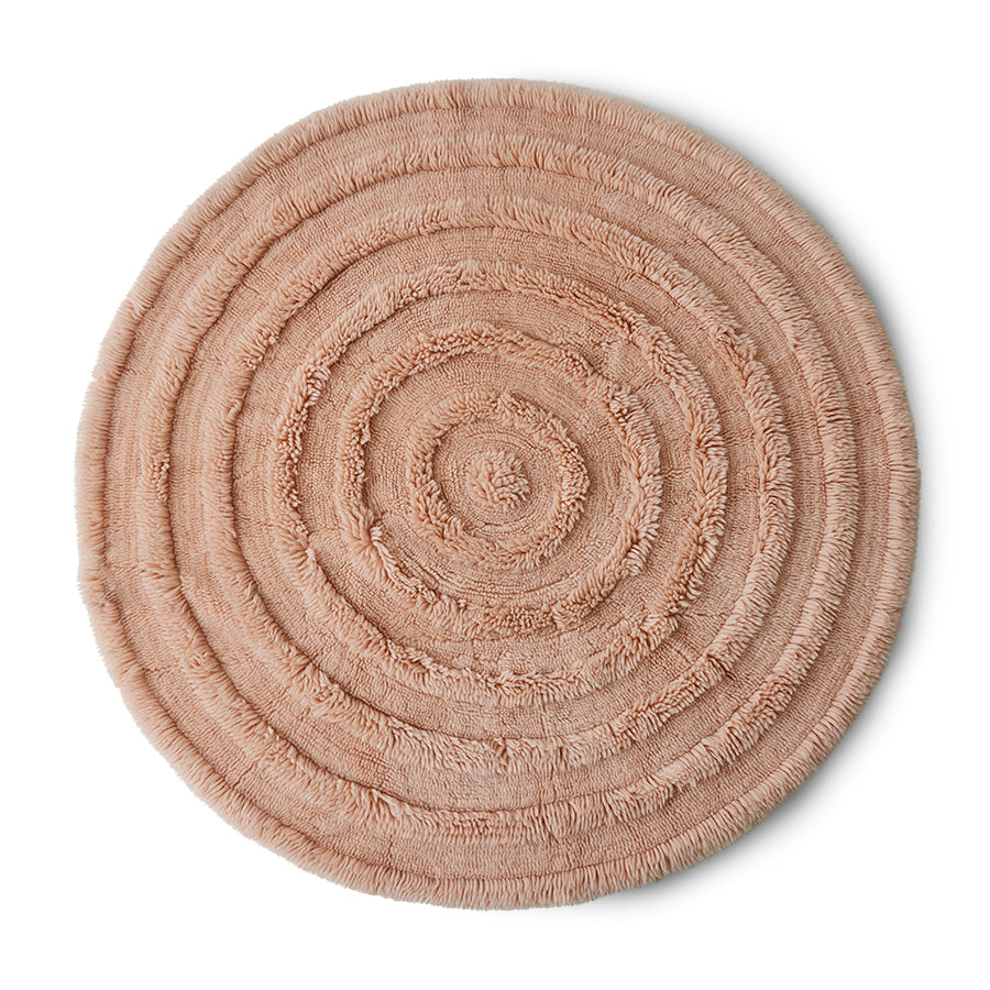 round soft pink colored woolen rug