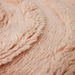 round soft pink colored woolen rug piles