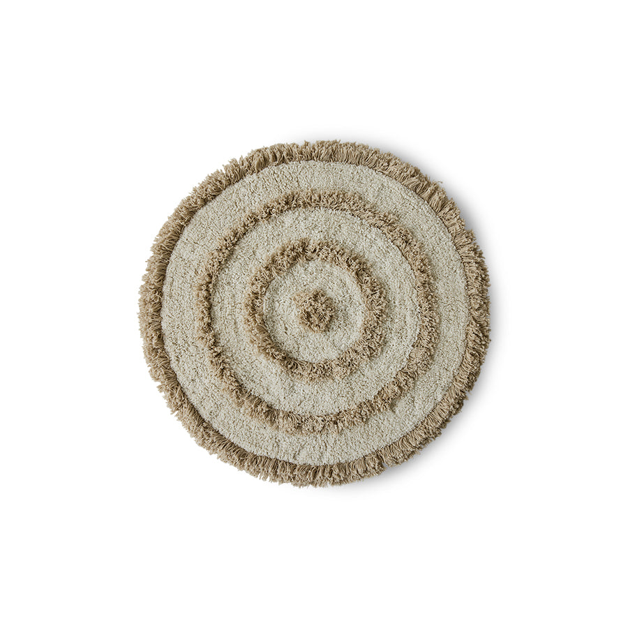 round bath mat with high and low pile and cream and beige color