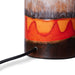 detail of retro style table lamp in brown, white orange and red