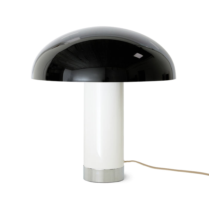 black white and chrome colored table lamp