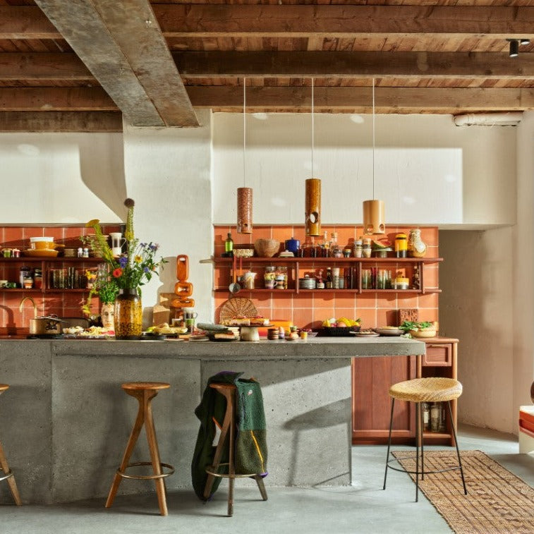 retro style kitchen with ceramic pendant lights over kitchen island