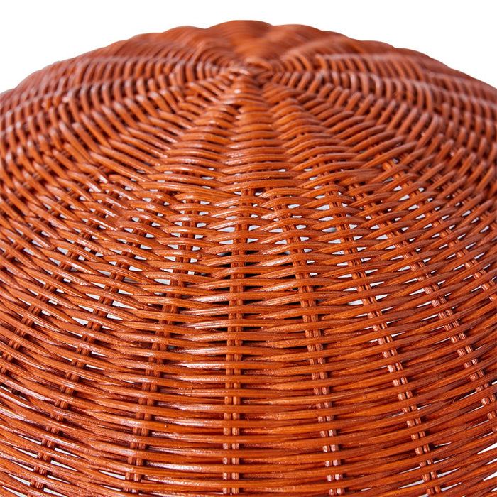 detail of coral colored retro style rattan table lamp