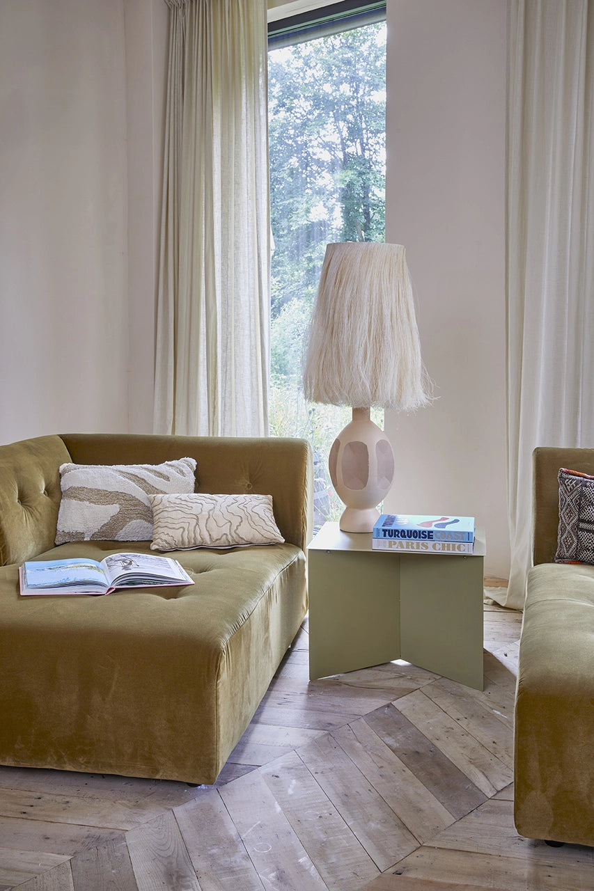Modern style Bohemian table lamp with large shade with strings and a ochre divan daybed