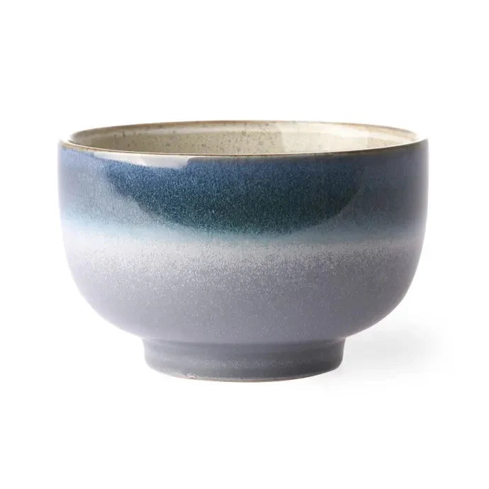 Ceramic bowl with blue gradient on a white background