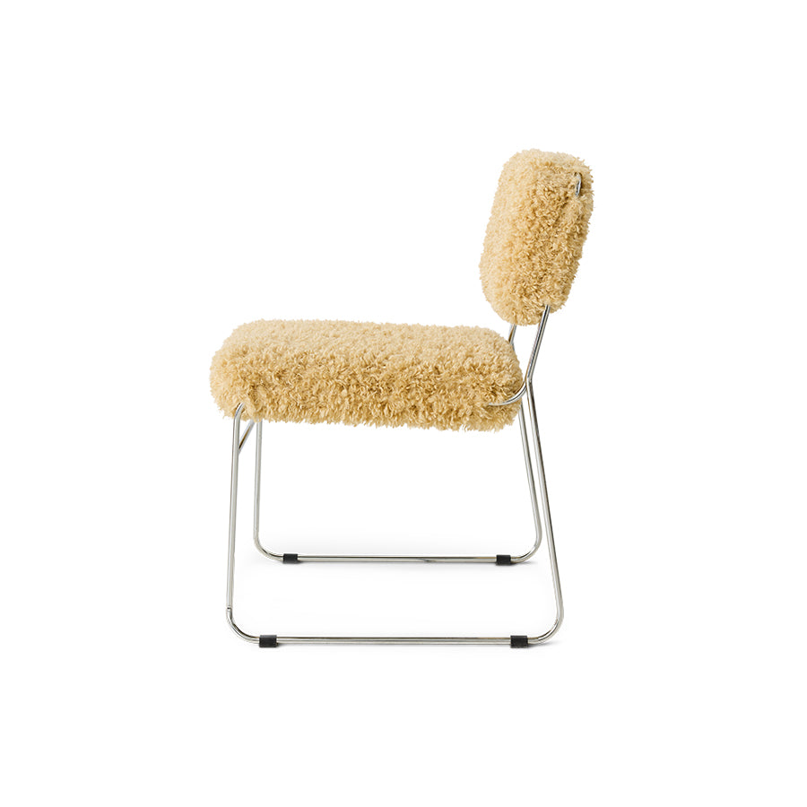 Chair with beige cushioned seat and backrest on a white background