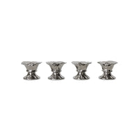 4 silver egg cups on white background
