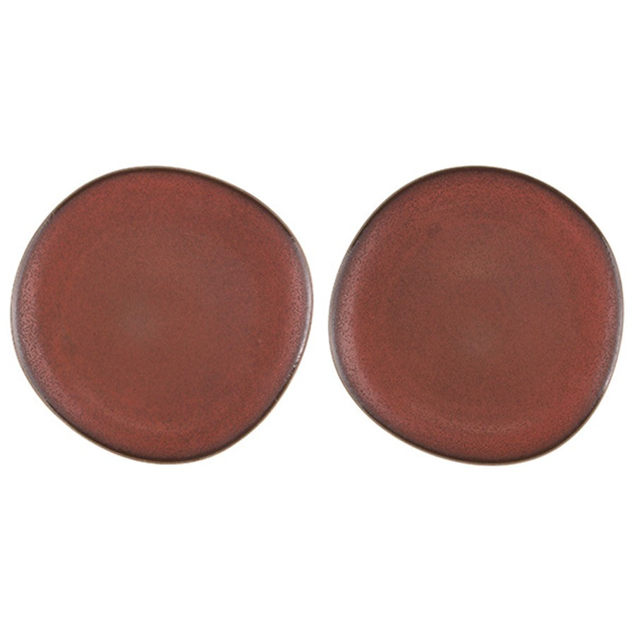 Two round reddish brown dinner plates on a white background