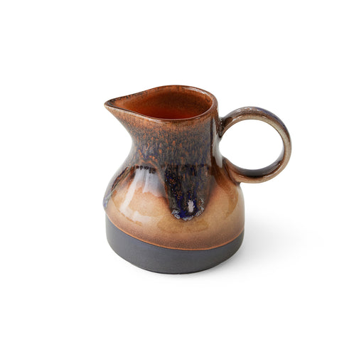 retro style creamer in brown tones with reactive glaze finish and texture