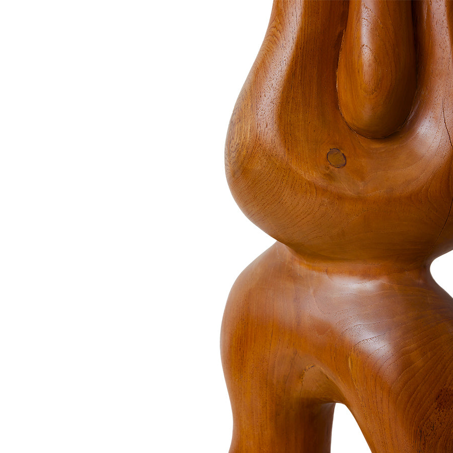 detail of teak wooden tall organic shape artwork totem