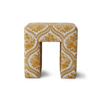 footstool with yellow and off white retro style fabric