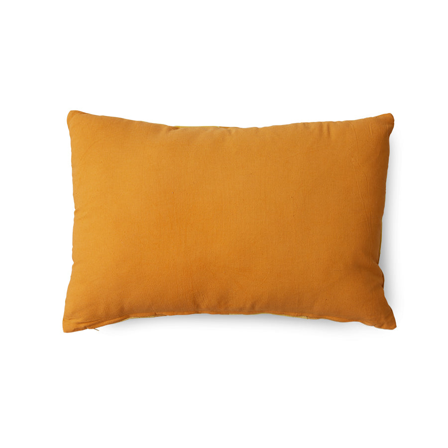 backside of orange and yellow diagonal striped velvet lumbar pillow