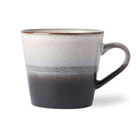 black and white stoneware mug with ear