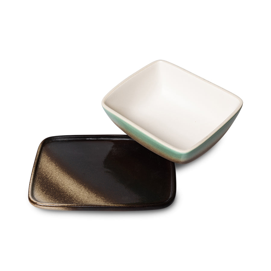 pink and green butterdish with brown tray
