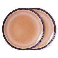 pink and purple colored stoneware dinner plates