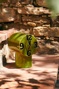 green desk clock numeric