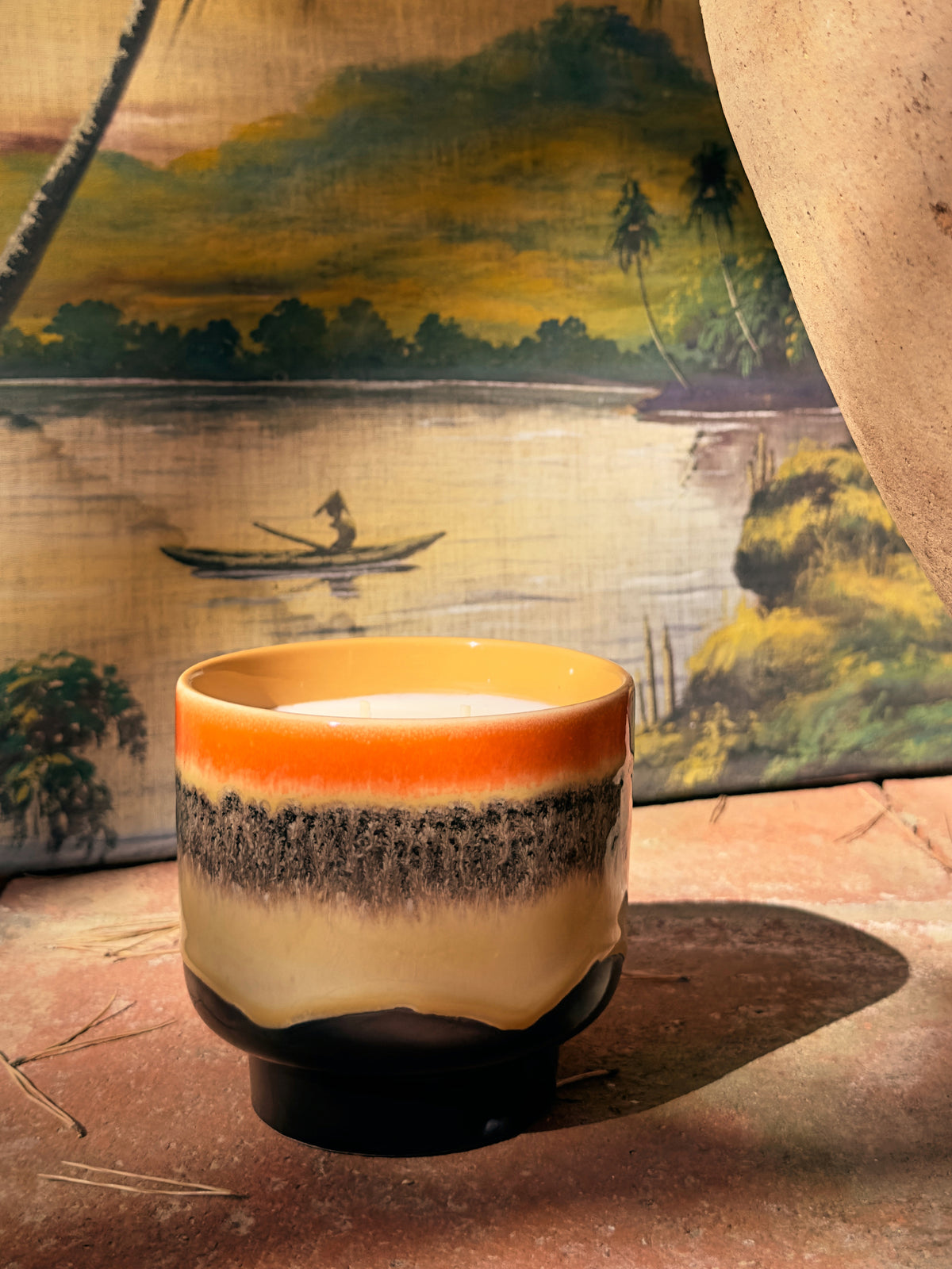 retro style ceramic vessel with scented candle