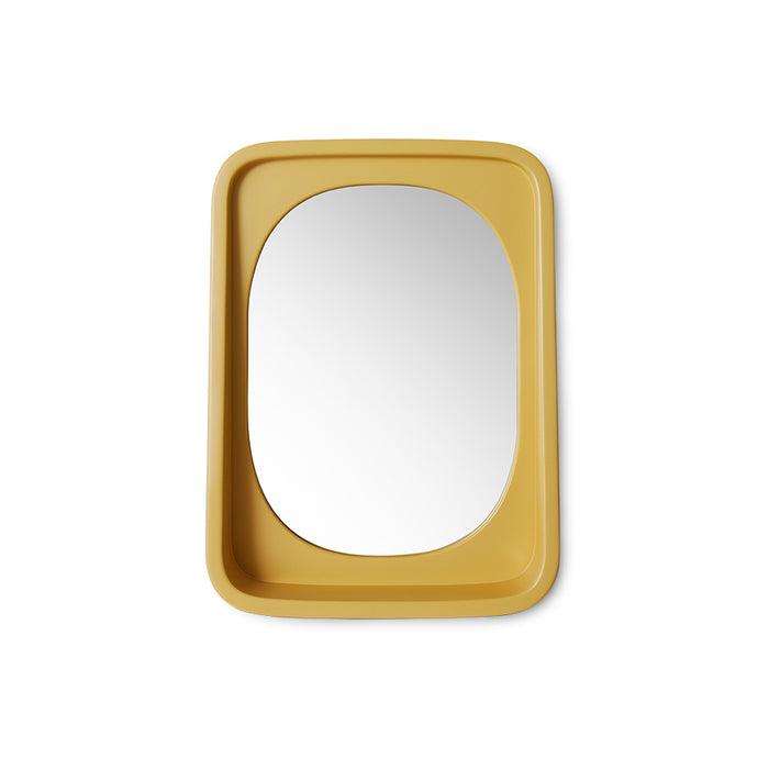 smooth surface ochre yellow mirror in frame with shelf