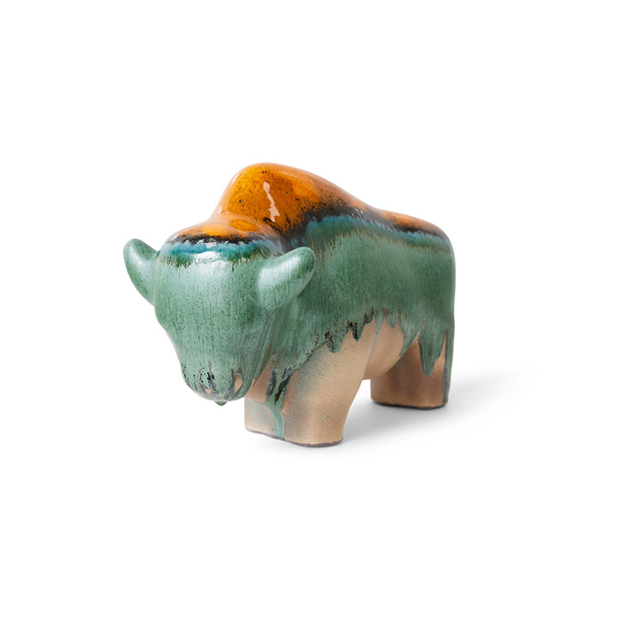 orange teal and green bull sculpture