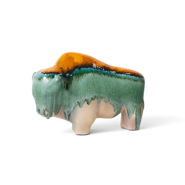 orange teal and green bull sculpture