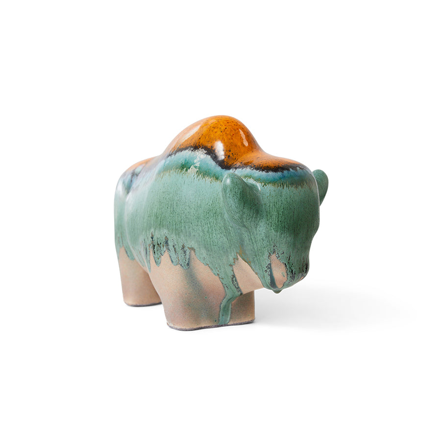 orange teal and green bull sculpture