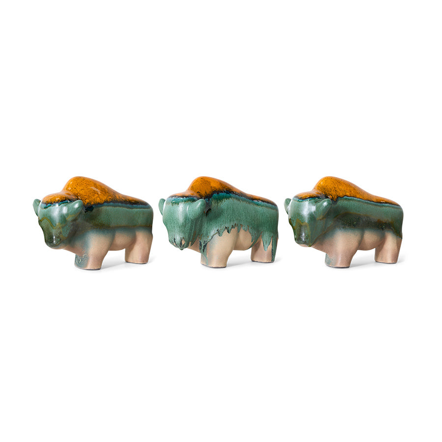 orange teal and green bull sculpture