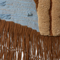 detail woolen tassels in hanging rug