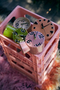 ceramic clocks in pink crate