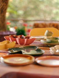 freeform shape ceramic serving bowl coral pink on table